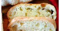 This homemade Ciabatta bread has a crispy outer crust, and a soft center with little crannies perfect for dipping into oil, butter, soups, & dips!