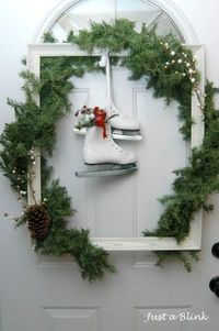 Picture Frame Wreath. I love this one - but would be great on the wall as well with a family Christmas pic inside each year (maybe in another smaller frame inside). Pretty Christmas decorations! I love the old skates!!!