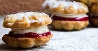 Vanilla Buttercream and Raspberry Jam Filled Shortbread Cookie Sandwiches