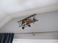 vintage airplane boys room/hobby lobby plane hung with fishing wire